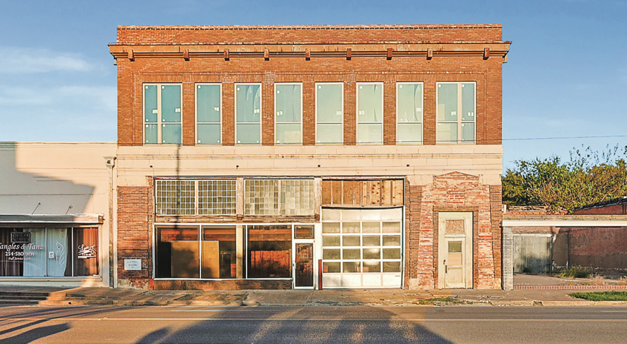 Historic brick commercial property for sale at 125 South Waco Street in Hillsboro, Texas